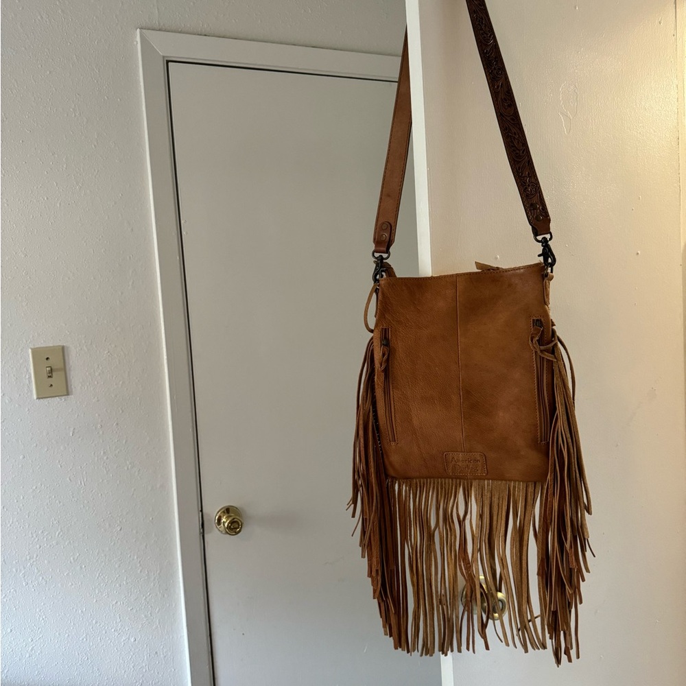 Cowhide American darling purse with back zippered pouch.